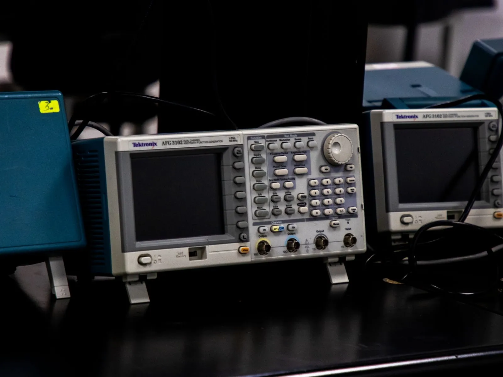 Arbitrary function generators and bench instruments in an electronics test lab